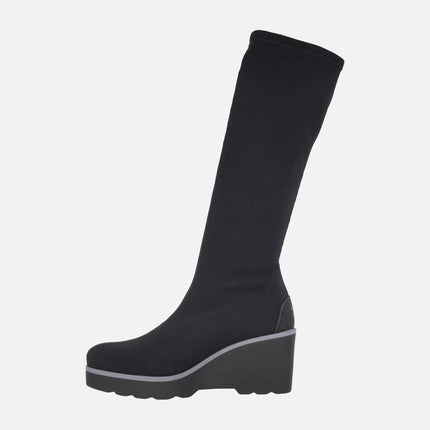 Botas altas de tejido elástico negro con cuña alta