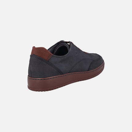 Zapatos deportivos en nobuck azul marino con detalles en rojo