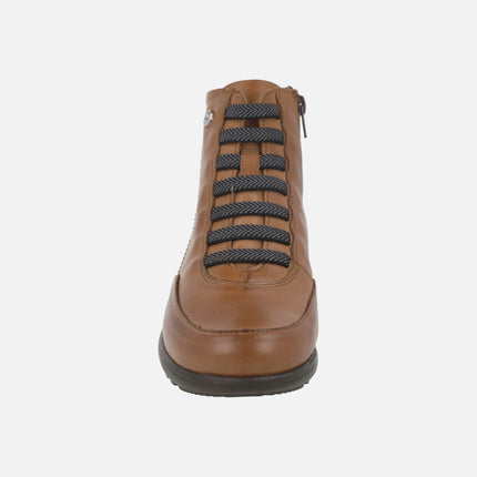 Botines de piel de estilo deportivo con gomas elásticas y cremallera