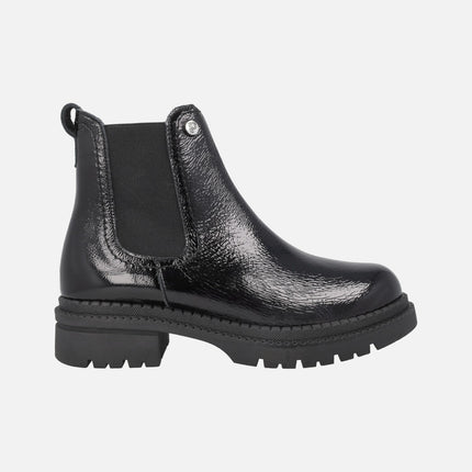 Botines negros de charol con elástico y piso track