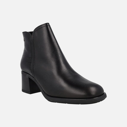 Botines en tacón medio con trasera combinada en coco