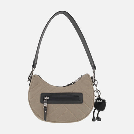 Hobo-style quilted fabric bags with pompom decoration