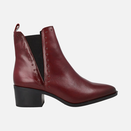 Botines chelsea de tacón medio con tachas