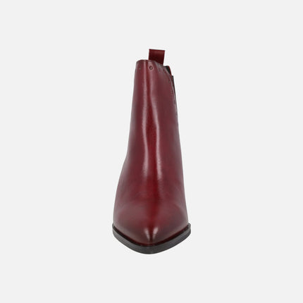 Botines chelsea de tacón medio con tachas