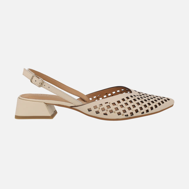 Zapatos de piel destalonados con calados y tachas Lagos