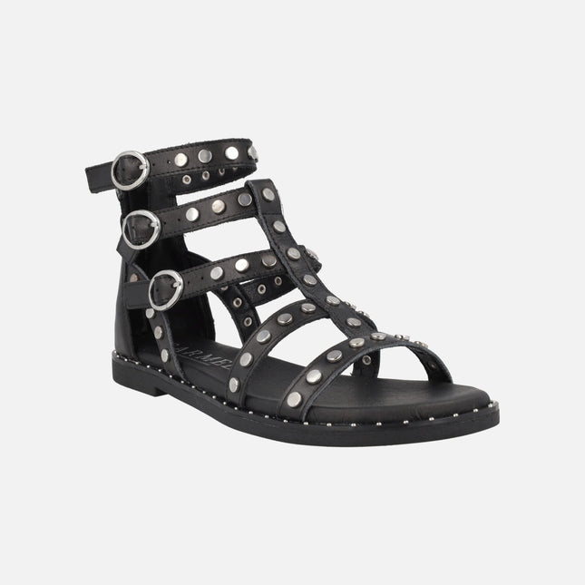 Roman sandals in black leather with silver studs and buckles
