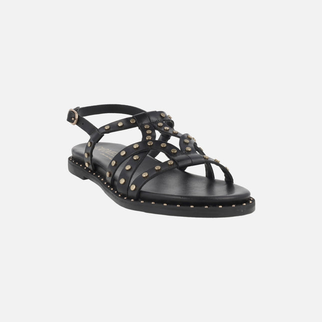 Flat leather sandals with gold studs