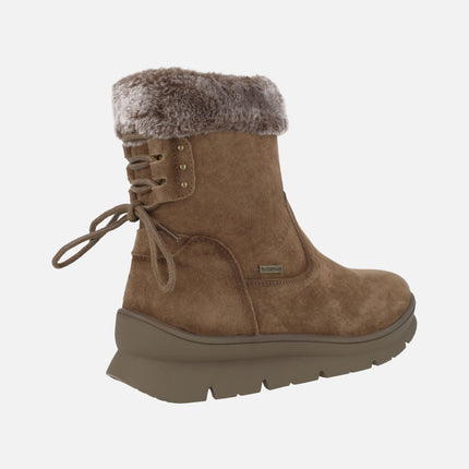 Botas de piel con ribete de pelo y membrana waterproof