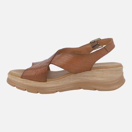 Brown leather sandals with heel strap and buckle