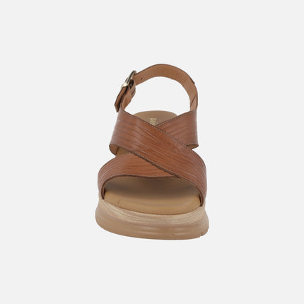 Brown leather sandals with heel strap and buckle