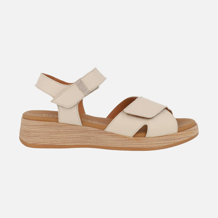 Leather sandals with low wedge and velcro closure