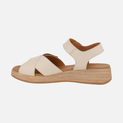 Leather sandals with low wedge and velcro closure
