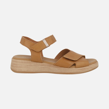 Leather sandals with low wedge and velcro closure