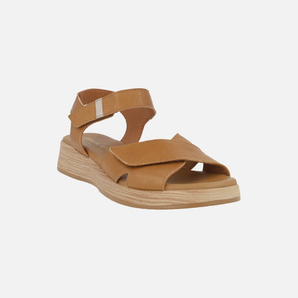 Leather sandals with low wedge and velcro closure