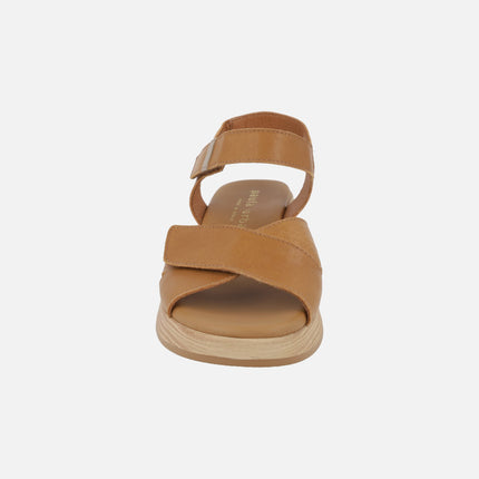 Leather sandals with low wedge and velcro closure