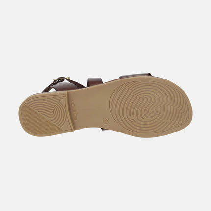 Sandalias marrones de piel con adorno de monedas color oro