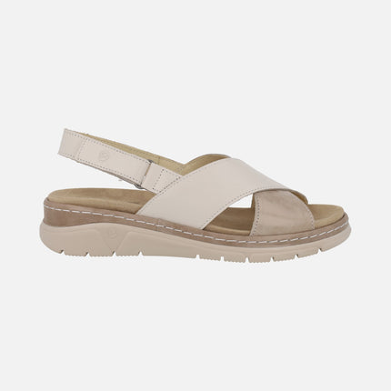 Cross-strap sandals in beige combination with velcro strap at the heel