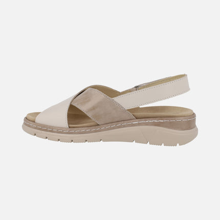 Cross-strap sandals in beige combination with velcro strap at the heel