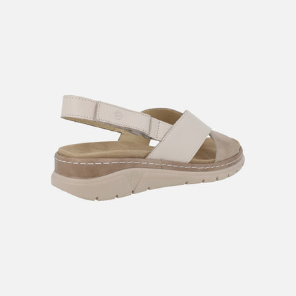 Cross-strap sandals in beige combination with velcro strap at the heel