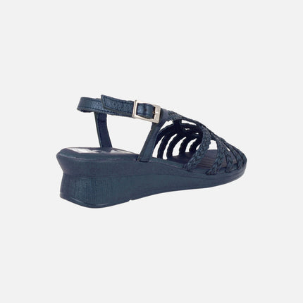 Sandalias confort bajas de piel trenzada