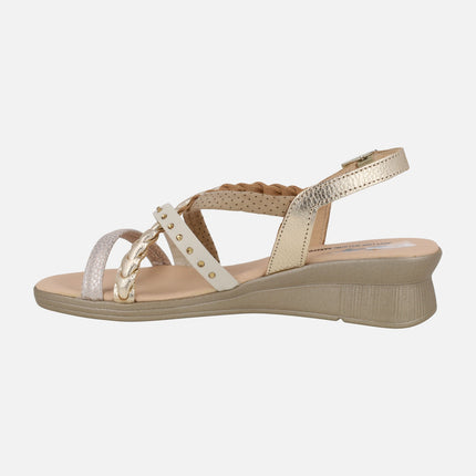 Beige sandals with multi-material straps and low wedge