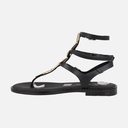 Sandalias planas de piel estilo romanas con detalle de monedas doradas
