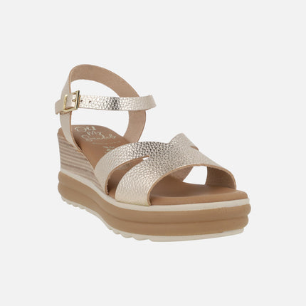 Wedge sandals in light gold metallic leather