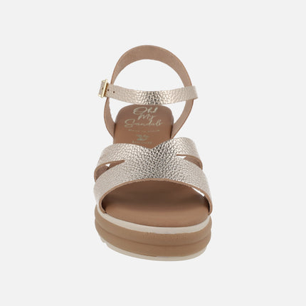 Wedge sandals in light gold metallic leather