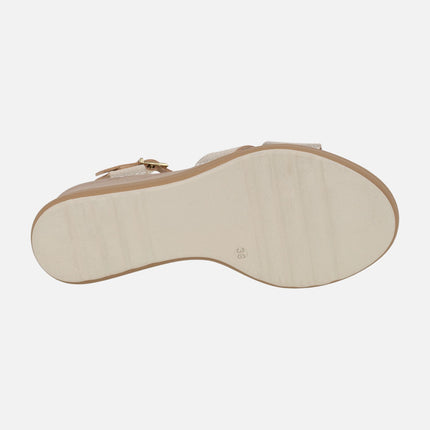 Wedge sandals in light gold metallic leather