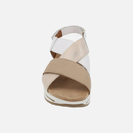 Beige and white crossed strap sandals with velcro closure