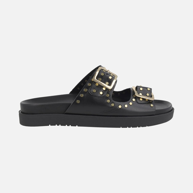 Sandalias negras de piel con hebillas y tachas doradas