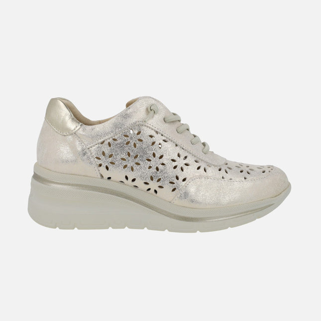 Die-cut sneakers in metallic gold with elastic laces