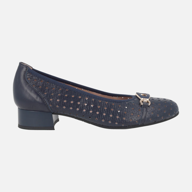 Low-heeled ballerinas in beige leather with studs