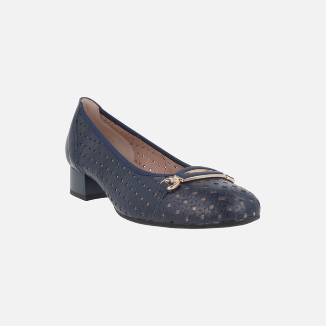 Low-heeled ballerinas in beige leather with studs