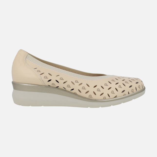 Low wedged shoes in beige leather with details and logos