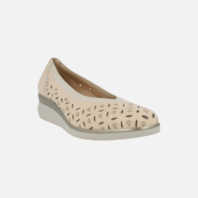 Low wedged shoes in beige leather with details and logos