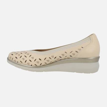 Low wedged shoes in beige leather with details and logos