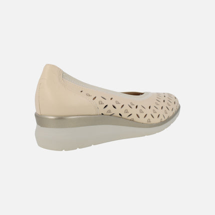 Low wedged shoes in beige leather with details and logos