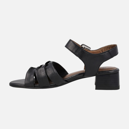 Black leather sandals with low heel and ankle bracelet