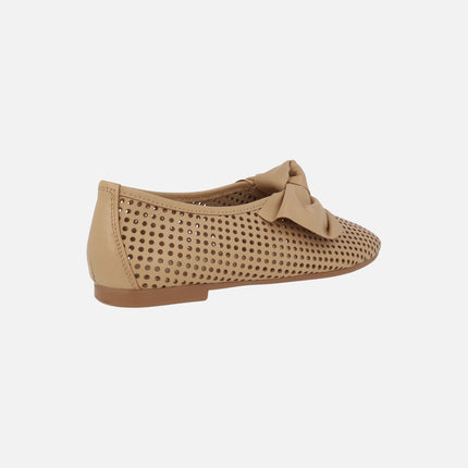 Leather shoes with openwork and bow decoration