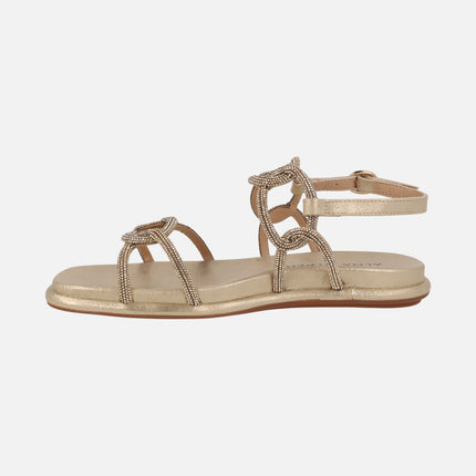 Sandalias doradas con eslabones de strass entrelazados