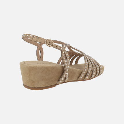 Beige wedged sandals with rhinestone straps