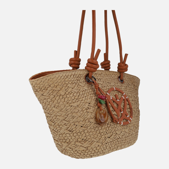 Raffia baskets with wooden decoration