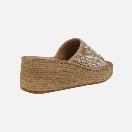 Tan Daisy ethnic fabric clogs with natural fiber platform