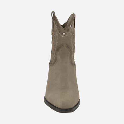 Cowboy style suede ankle boots with metal studs and rhinestones detail