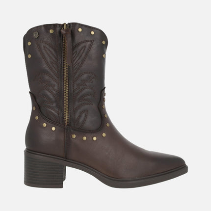 Low cowboy-style leather boots with studs and embroidery