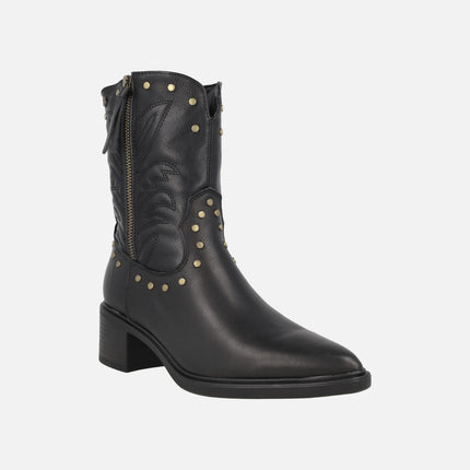 Low cowboy-style leather boots with studs and embroidery