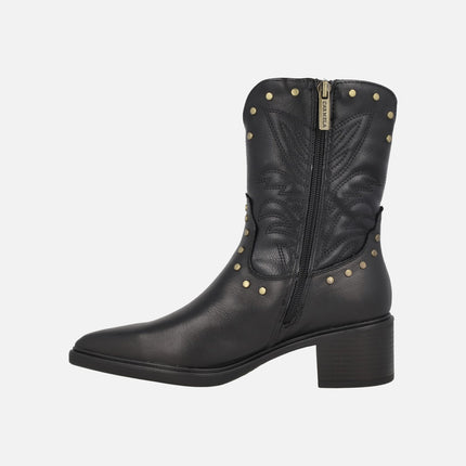 Low cowboy-style leather boots with studs and embroidery