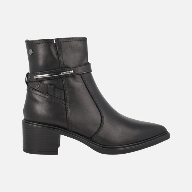 Women's high-heeled ankle boots in black leather with metallic decoration