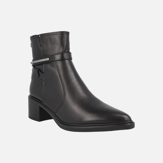 Women's high-heeled ankle boots in black leather with metallic decoration